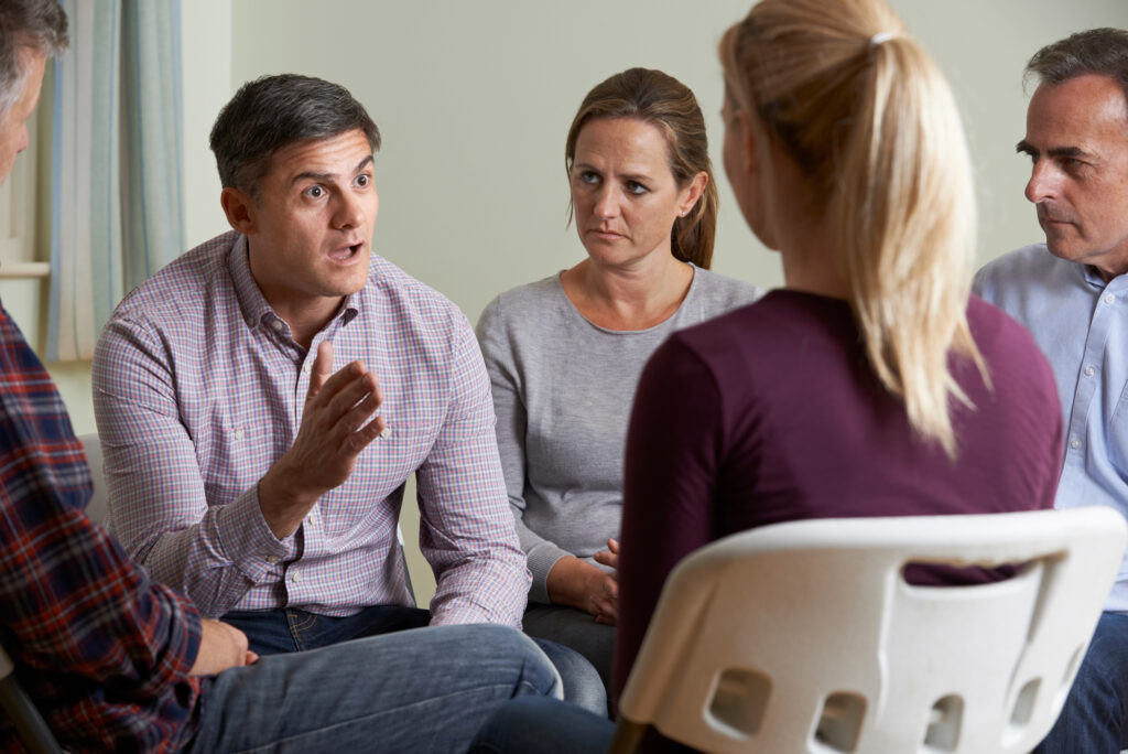 parents talking to their daughter at a residential rehab